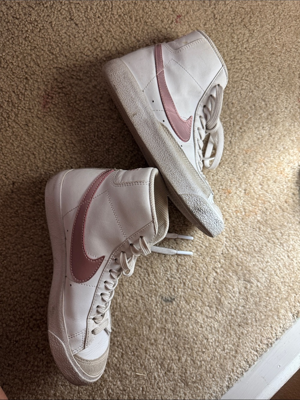 Nike Women's White High-Top Sneakers with Pink Swoosh